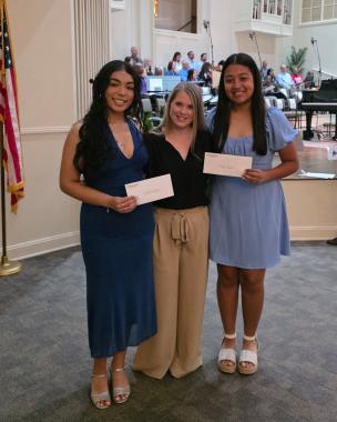 Girls receiving scholarship from Citizens Bank