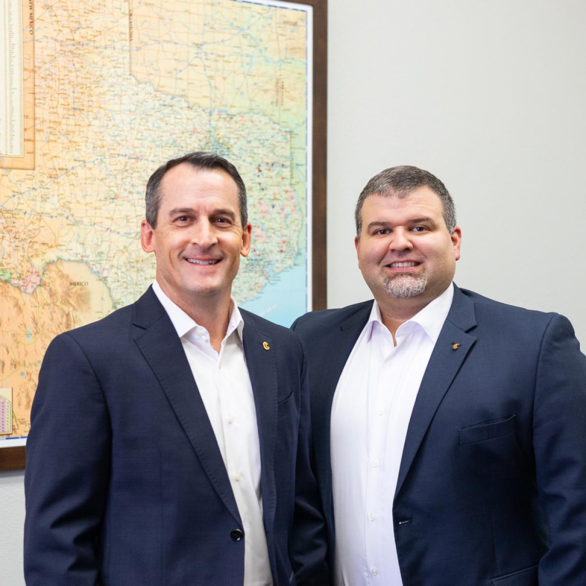 two businessmen in suits